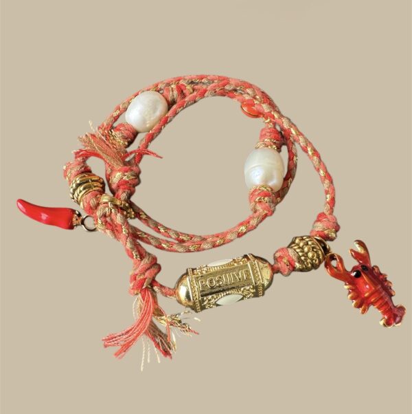 Cordón coral con tubito positive y perlas